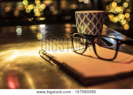 Points Notebook And Cup Of Coffee