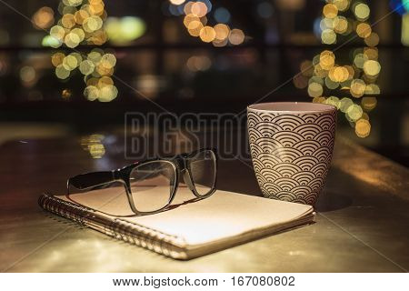Points Notebook And Cup Of Coffee