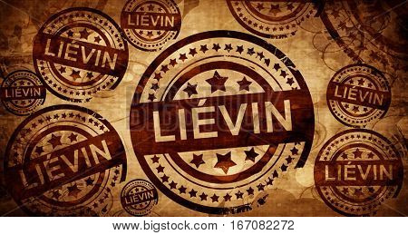 lievin, vintage stamp on paper background