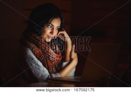 young woman tired looking at the screen laptop