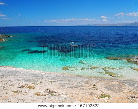 Beautiful view of the oat on the blue sea