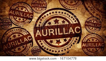 aurillac, vintage stamp on paper background