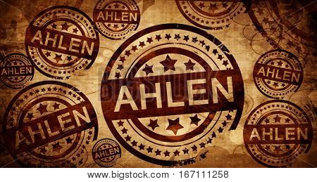 Ahlen, vintage stamp on paper background