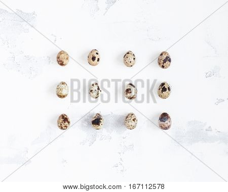 Easter eggs on white background. Flat lay top view