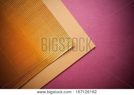 stylish vintage background with corrugated golden paper