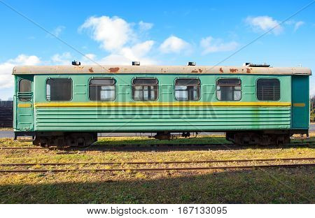 Green narrow-gauge railway wagon . ... .