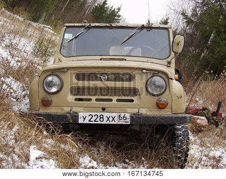 All-terrain vehicle fell into a swamp. dense forest