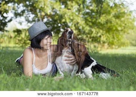 The woman with the dogs in the countryside Selective focus and small depth of field lens flare