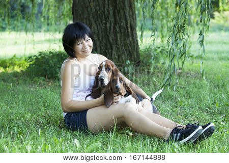 The woman with the dogs in the countryside Selective focus and small depth of field lens flare