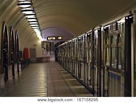 train cars with open doors on the station platform of the Moscow underground
