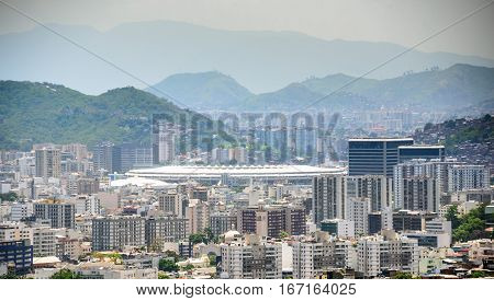 Aerial view from Santa Teresa hill to Sao Cristovao, Maracana and Tijuca neighborhoods, football Stadium and Tijuca Forest National Park of Northern Zone of Rio de Janeiro, Brazil