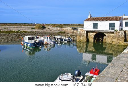 Loix France - september 26 2016 : the picturesque water mill in autumn