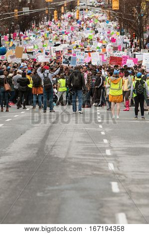 ATLANTA, GA - JANUARY 2017:  Thousands of protesters with signs are lined up and ready to start walking in the Atlanta march for social justice and women the day after President Trump's inauguration in Atlanta GA on January 21 2017.