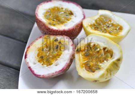 sliced passion fruit in the plate , passion fruit