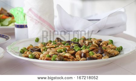 Broad bean fried on plate with Tissue and white cloth for appetizer food