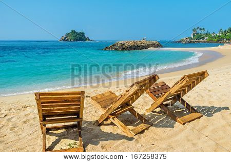 The Wooden Chairs At The Coast