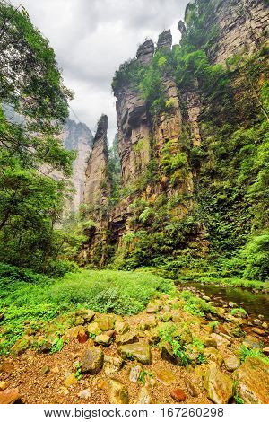 Beautiful View Of Steep Cliffs On Stormy Sky Background