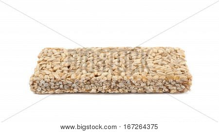 Single piece of a gozinaki confection sweets isolated over the white background