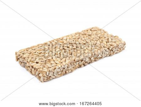 Single piece of a gozinaki confection sweets isolated over the white background