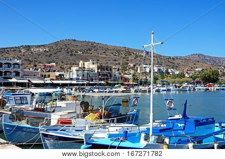 ELOUNDA, CRETE - SEPTEMBER 17, 2016 - Traditional fishing boats in the harbour Elounda Crete Greece Europe, September 17, 2016.