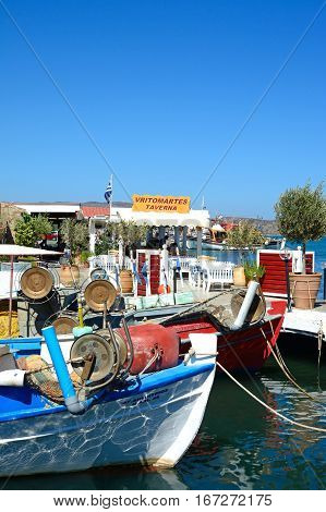 ELOUNDA, CRETE - SEPTEMBER 17, 2016 - Traditional fishing boats in the harbour Elounda Crete Greece Europe, September 17, 2016.
