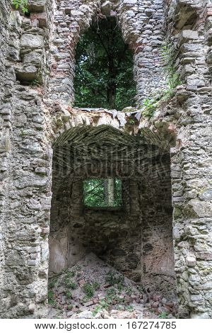 Ruins of the medieval church  - detail of gate and window