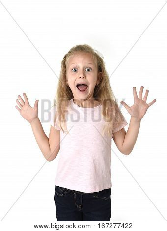 portrait of cute and sweet little girl in disbelief and surprise face expression looking amazed in schock with mouth opened isolated on white background