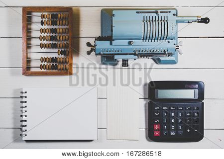 Old Calculating Machine On A Wooden Table