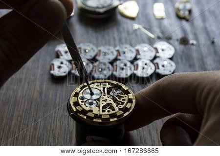 The procces of watch repair with the special tools