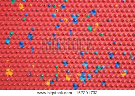 Close-up crop fragment of an orthopedic mat with spikes