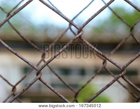 Photo of two wire fences standing next to each other