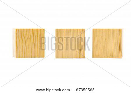 Three brown wooden cubes lined up in a row over white background