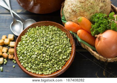 Ingredients for dried split pea vegetarian soup - carrot celery root onion parsley