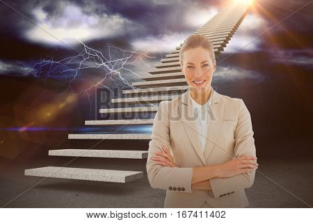 Portrait of a young businesswoman with arms crossed smiling against thunderstrom over landscape 3d