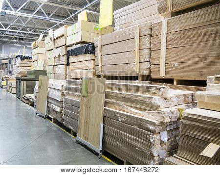 Large furniture warehouse of industial store. Warehouse of building materials shop
