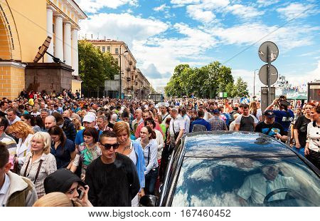 SAINT PETERSBURG RUSSIA - JULY 31 2016: People celebrate the Navy day at the Admiralty embankment in sunny day
