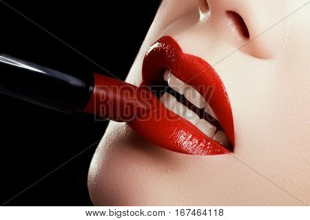 Close-up Of Woman's Lips With Fashion Red Make-up. Beautiful Female Mouth, Full Lips With Perfect Ma