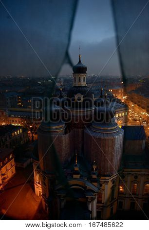Restoration of the Cathedral of Vladimir  Icon of Our Lady in Saint- Petersburg.
 Vladimirsky Cathedral in the construction staging. 
The Cathedral against the background of the evening city. Top view of the Cathedral from the bell tower through the const