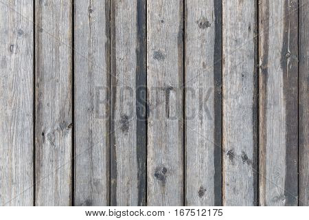 exture of wooden planks on the floor of the old