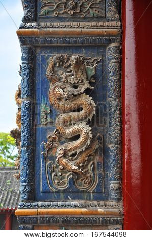 Decorative Dragon on the wall in the Shenyang Imperial Palace Mukden Palace, Shenyang, Liaoning Province, China. Shenyang Imperial Palace UNESCO world heritage site built in 400 years ago.