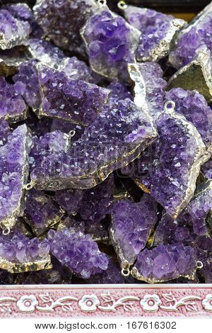 Raw violet amethyst rock with crystal ametist esoteric