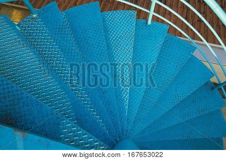 Spiral Stair Of Footbridge With The Sun Ray Light And Shadow In Daytime