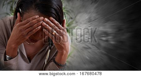 Woman having a migraine headache.