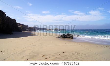 BIG SUR, CALIFORNIA, UNITED STATES - OCT 7, 2014: Huge ocean waves crushing on rocks in Garrapata State Beach in CA along Highway No 1, USA.
