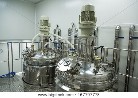 two chromed high-pressure tanks in pharmaciutical factory