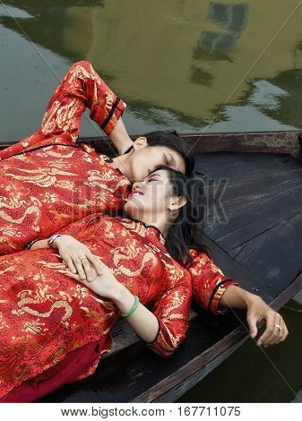 Hoi An Vietnam - Dec 28 2016: Wedding photo shoot on the Thu Bon river. Its beauty and charm makes it popular with photographers.