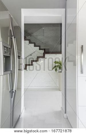 Entrance To Kitchen With Refrigerator