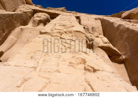 Very old egyptian ancient temple giant pharaohs sculptures made of stone