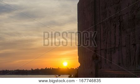 Egypt, watching sunset standing at ancient temple ruins