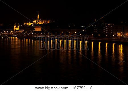 Night Few On Fisherman's Bastion And St. Matthias Church From The Side Of The Dunabe River, Budapest